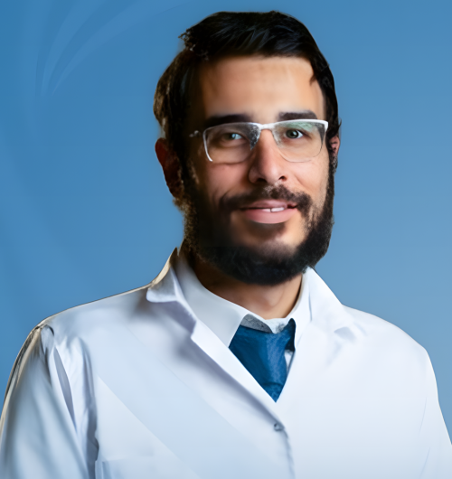 د أيمن أحمد حسين - إستشارى جراحه المخ و الاعصاب و العمود الفقرى